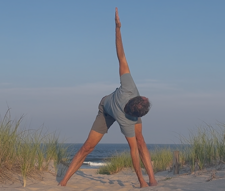 Raji in wide straddle twist