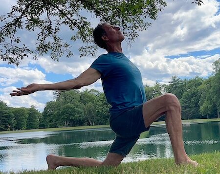 Raji teaching breath practices Raji in a heart opening pose.